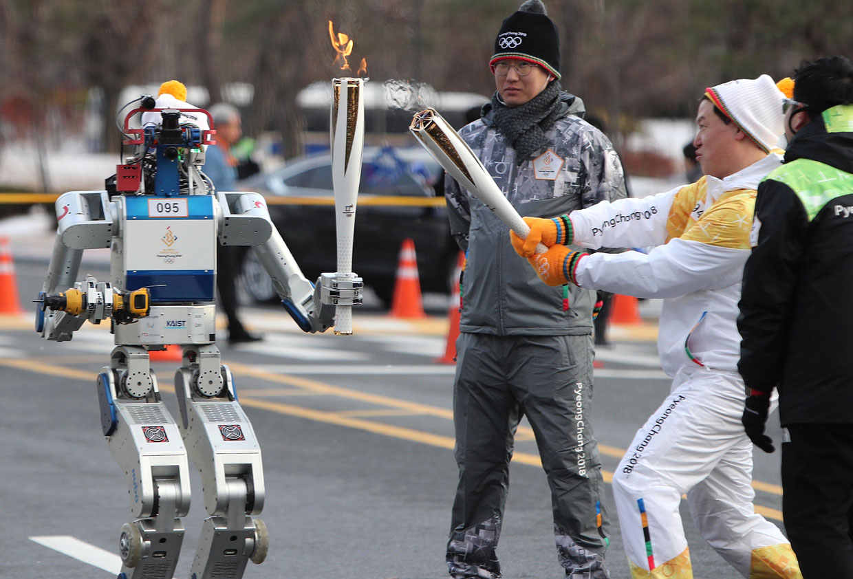 Роботы, готовые кататься на лыжах, рисовать и чистить на зимних Олимпийских Играх в Южной Корее 2018 года