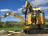 Экскаватор с двумя ковшами